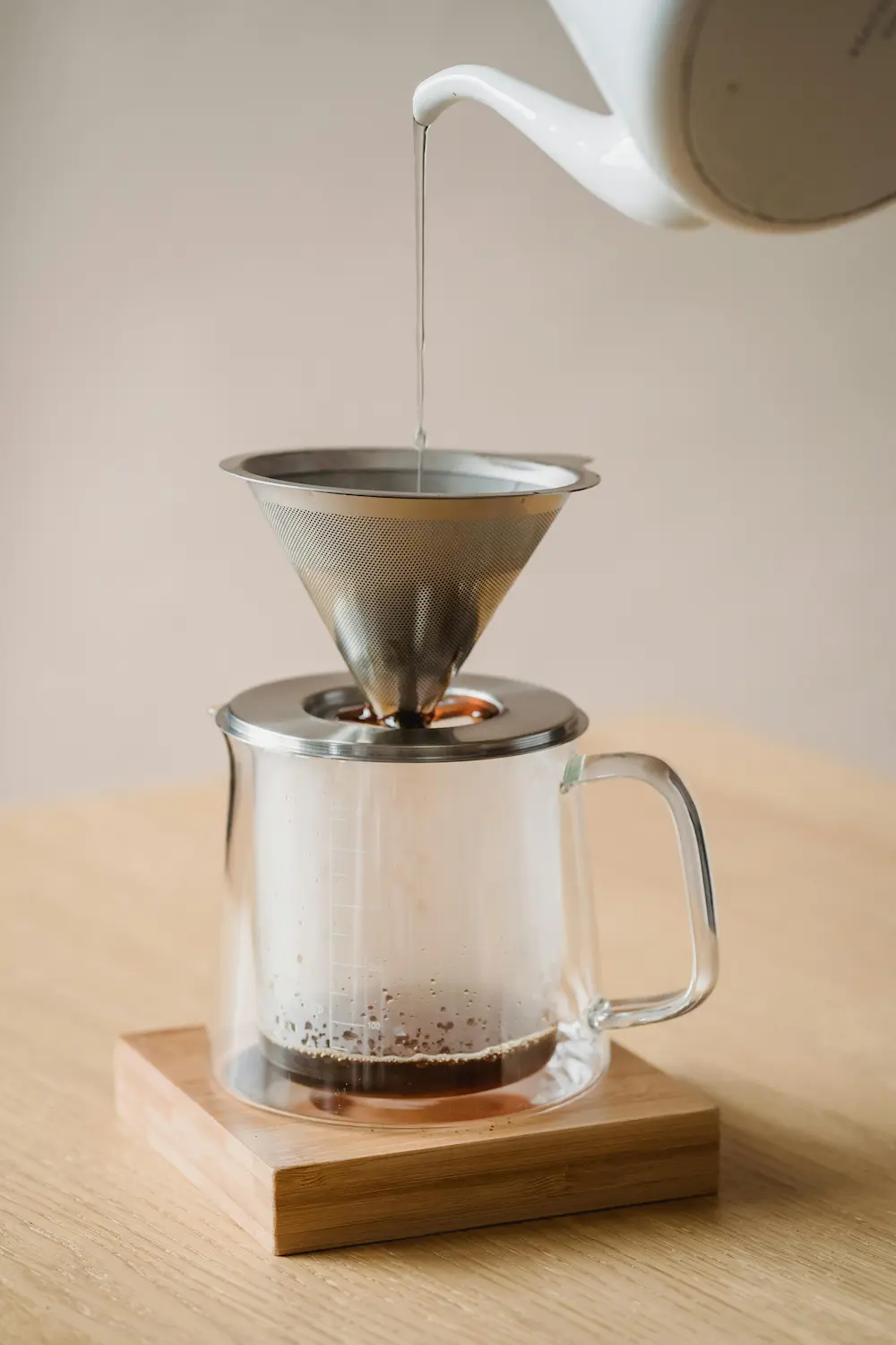 A stainless steel coffee filter and French press